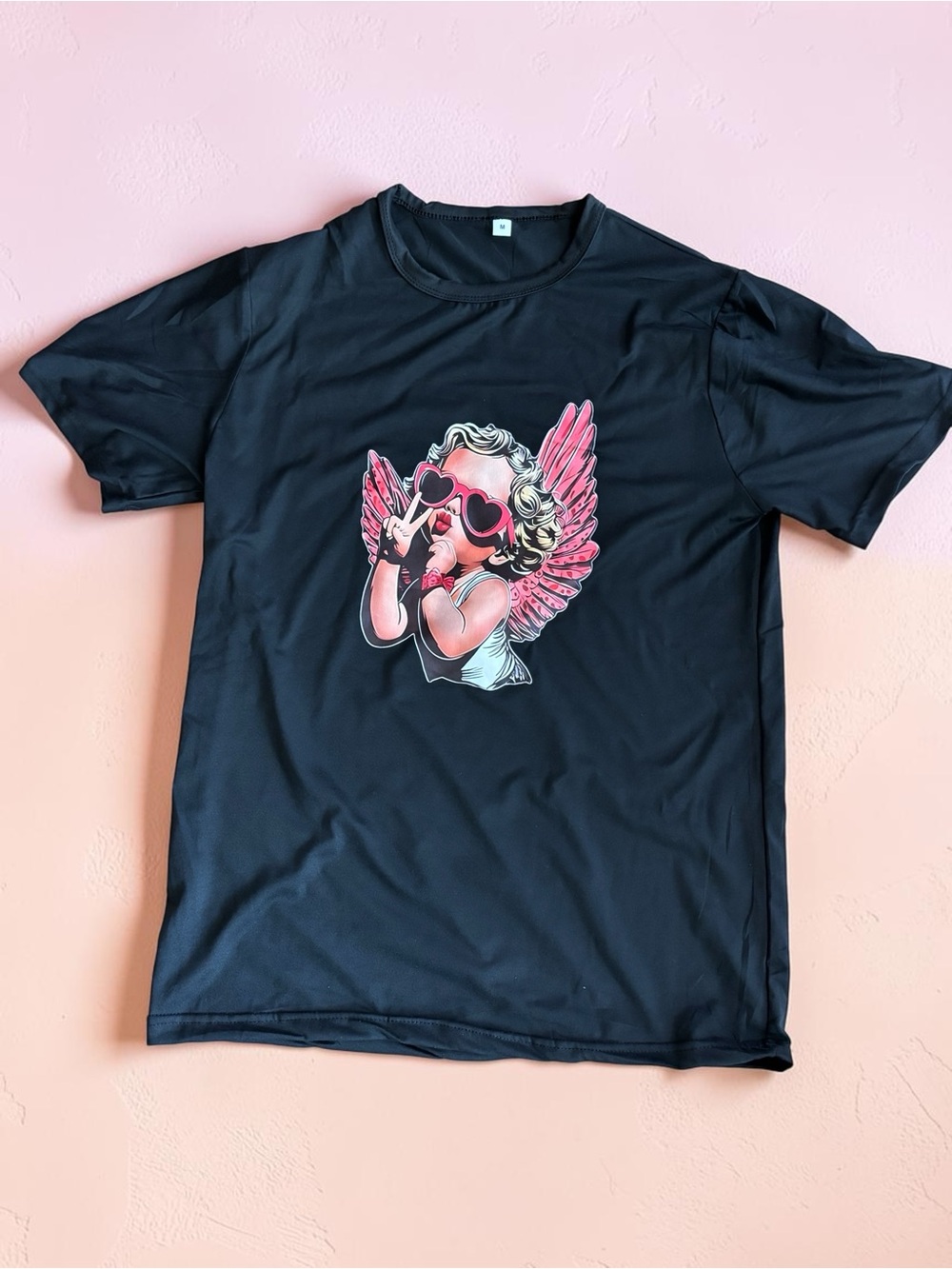 Black Short-Sleeve Tee with Pink Cherub Graphic(Medium)